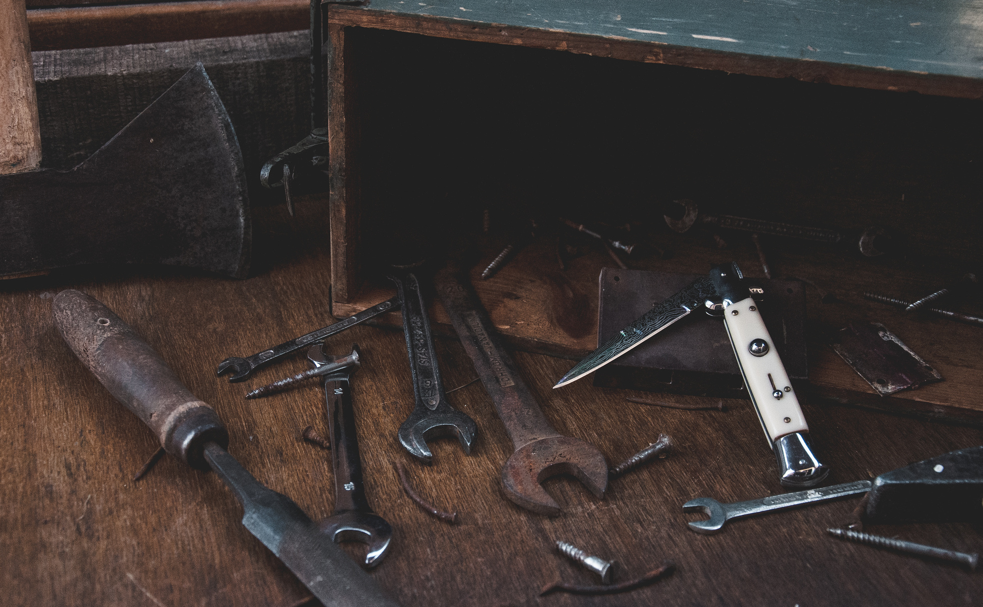 Carpentry instruments placed on wooden table